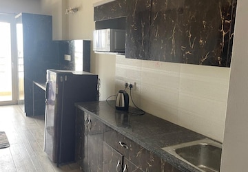 Kitchen in 1 BHK Apartment at Paramount Golfforeste, Zeta I Greater Noida – for Rent