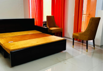 Living Room in 1 BHK Apartment at Wave Dream Homes, Ram Nagar – for Rent