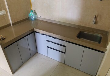 Kitchen in 1.5 BHK Apartment at Dosti West County, Balkum Pada – for Rent