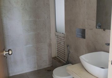 Bathroom in 1.5 BHK Apartment at Dosti West County, Balkum Pada – for Rent