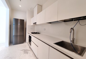 Kitchen in 1 BHK Apartment at Bhartiya Leela Residences, Thanisandra Main Road – for Rent