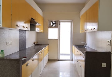 Kitchen in 3 BHK Apartment at Exotica Fresco, Sector 137 – for Rent