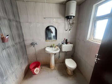 Bathroom in 3 BHK Apartment at DLF The Skycourt, Sector 86 – for Rent