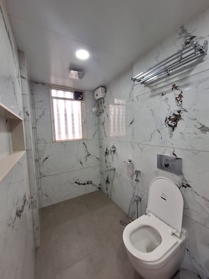 Master Bedroom in 4 BHK Apartment at Aramus The Domus, Seawoods – for Sale