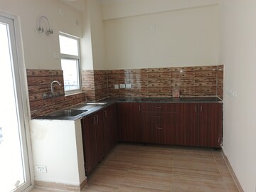 Kitchen in 2 BHK Apartment at Amrapali Terrace Homes, Tech Zone 4 Greater Noida – for Rent