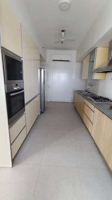 Kitchen in 4 BHK Apartment at Adani Oyster Grande Phase 2, Sector 102 – for Rent