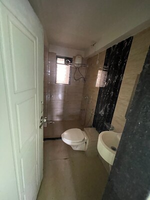 Bathroom in 2 BHK Apartment at Yasmin Tower, Agripada – for Sale