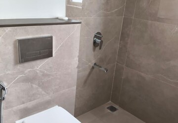 Bathroom in 1 BHK Apartment at Piramal Revanta, Mulund West – for Rent