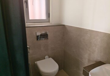 Bathroom in 1 BHK Apartment at Piramal Revanta, Mulund West – for Rent
