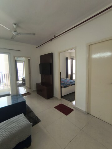 Living Room in 2 BHK Apartment at Signature Global The Millennia, Sector 37d – for Rent