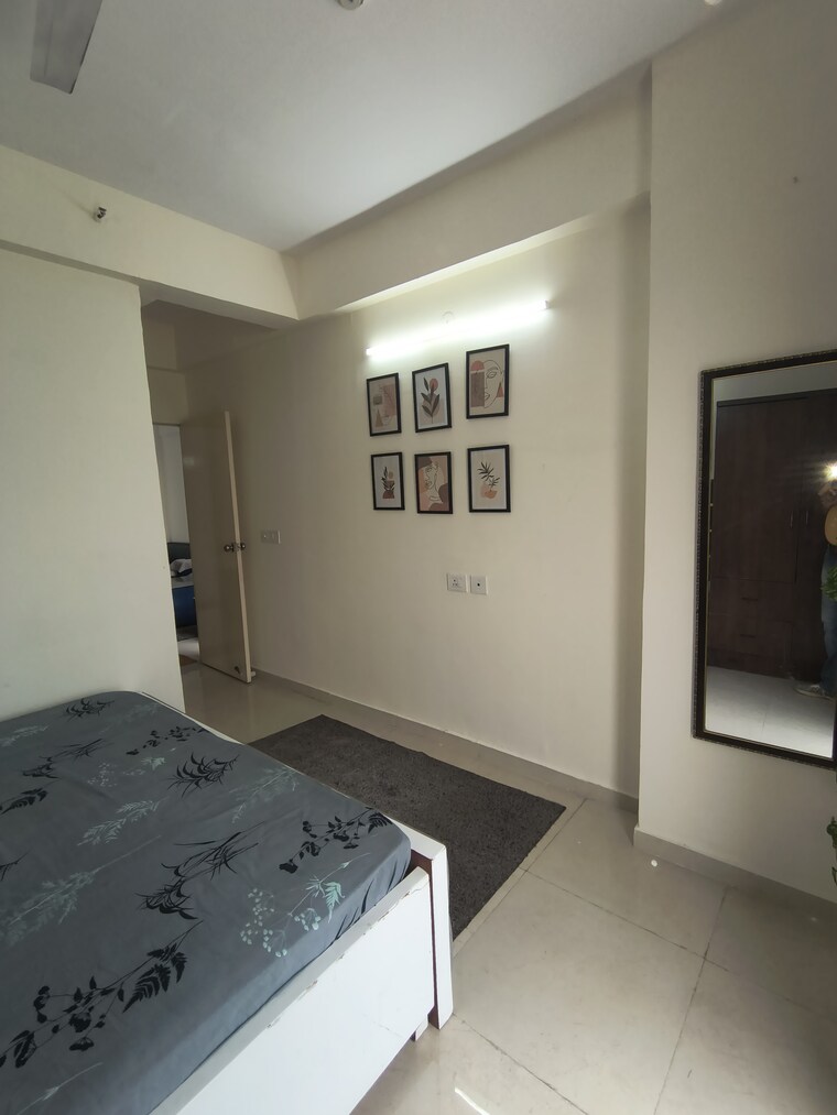 Bedroom, signature-global-the-millennia 2 Bedroom 1050 Sq.Ft. Apartment In Sector 37d Gurgaon 9350602