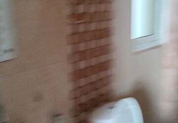 Bathroom in 2 BHK Apartment at Ansal Paradise Crystal, Sushant Golf City – for Rent