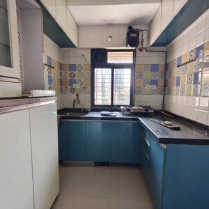 Kitchen in 1 BHK Apartment at Raunak Heights, Ghodbunder Road – for Rent
