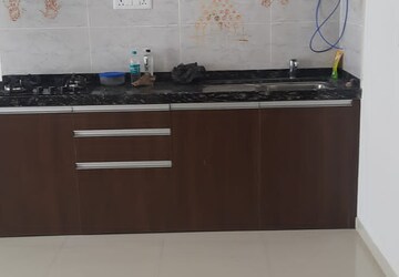 Kitchen in Studio Apartment at Gera World of Joy, Kharadi – for Rent