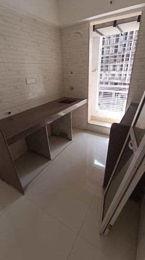 Kitchen in 1 BHK Apartment at Ravi Gaurav Crest, Mira Road – for Sale
