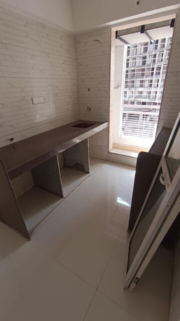 Kitchen in 1 BHK Apartment at Ravi Gaurav Crest, Mira Road – for Sale