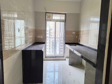 Kitchen in 1 BHK Apartment at Puranik Tokyo Bay Phase 2A, Kasarvadavali – for Rent