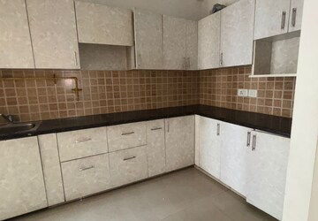 Kitchen in 2 BHK Apartment at Mahagun Mahagunpuram, Shastri Nagar – for Sale