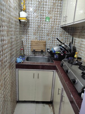 Kitchen in Studio Independent House at RWA Apartments Sector 26, Sector 26 – for Rent