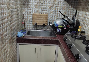 Kitchen in Studio Independent House at RWA Apartments Sector 26, Sector 26 – for Rent