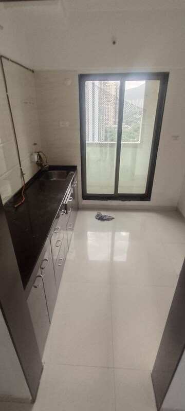 Kitchen in 1 BHK Apartment at Spring Hills, Manpada – for Rent