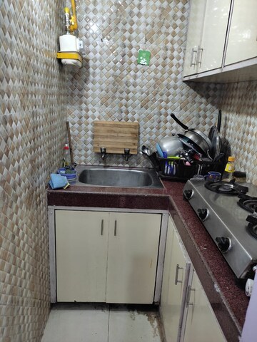 Kitchen in Studio Independent House at RWA Apartments Sector 50, Sector 50 – for Rent