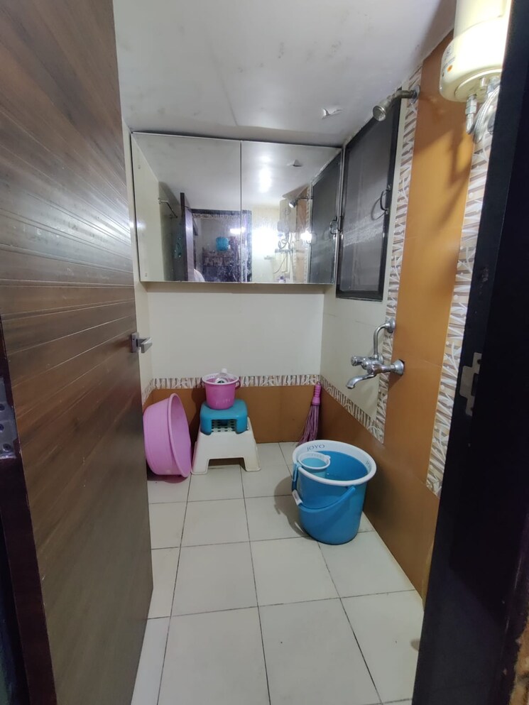 Bathroom, star-paradise-mira-road 1 Bedroom 600 Sq.Ft. Apartment In Mira Road Thane 9350784