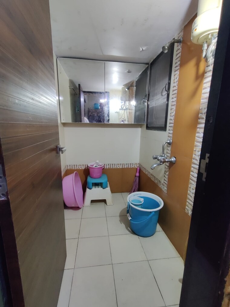 Bathroom, star-paradise-mira-road 1 Bedroom 600 Sq.Ft. Apartment In Mira Road Thane 9350784
