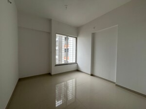 Room in 2 BHK Apartment at Triaa Kosmic Kourtyard, Wagholi – for Rent