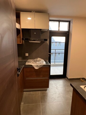 Kitchen in 3 BHK Apartment at Krisumi Waterfall Residences, Sector 36a – for Rent