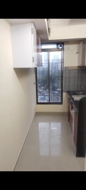 Kitchen in 1 BHK Apartment at Parel Lokseva CHS, Worli – for Rent