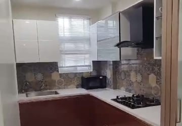 Kitchen in 2.5 BHK Apartment at Amrapali Platinum, Sector 119 – for Sale