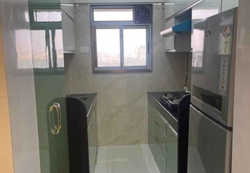 Kitchen in 5 BHK Apartment at Raunak Viraj Tower , Pokhran Road No Two – for Sale