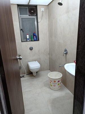 Bathroom in 1 BHK Apartment at Runwal Eirene, Balkum Pada – for Rent