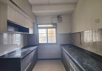 Kitchen in 2 BHK Apartment at Acme Ozone, Manpada – for Sale