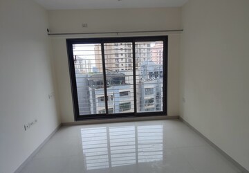 Room in 2 BHK Apartment at Acme Ozone, Manpada – for Sale