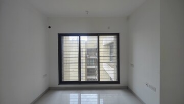Room in 2 BHK Apartment at Acme Ozone, Manpada – for Sale