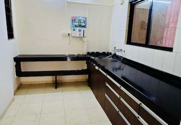 Kitchen in 2 BHK Apartment at Nyati Meadows, Wadgaon Sheri – for Rent
