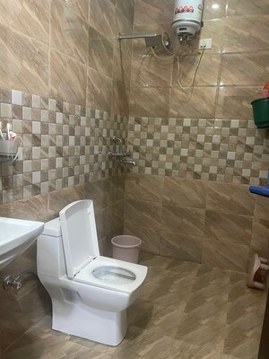 Bathroom in 3 BHK Builder Floor at Dhakoli – for Rent