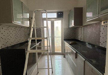 Kitchen in 2 BHK Apartment at Omkar Alta Monte, Malad East – for Rent