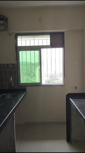 Kitchen in 1 BHK Apartment at Shivshankar Shivram Palladium, Bhandup West – for Sale