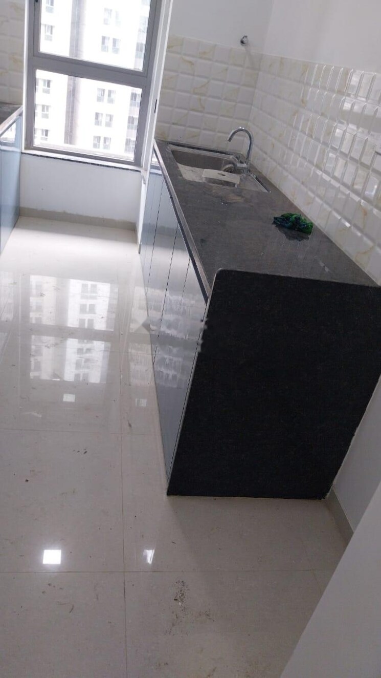 Kitchen, kalpataru-immensa 2 Bedroom 808 Sq.Ft. Apartment In Kolshet Road Thane 9352016