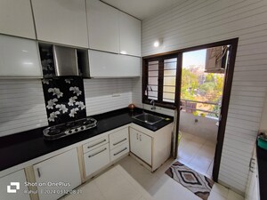 Kitchen in 3 BHK Apartment at Prahlad Nagar – for Rent