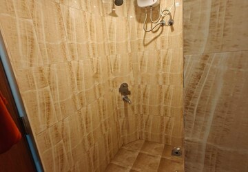 Bathroom in 2 BHK Apartment at Piramal Vaikunth, Balkum Pada – for Rent
