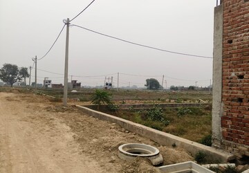Plot Area in  Plot at Dhanauli – for Sale