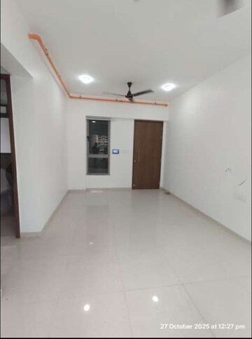 Living Room in 2 BHK Apartment at Kalpataru Immensa, Kolshet Road – for Rent