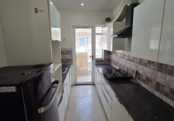 Kitchen in 3 BHK Apartment at Sushma Valencia, Nagla Road – for Rent