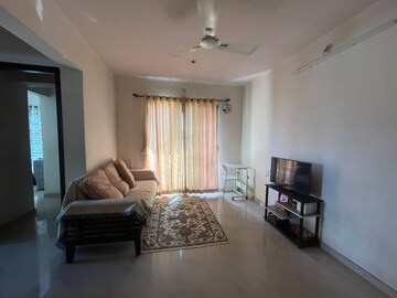 Living Room in 1 BHK Apartment at Damji Shamji Shah Mahavir Estella, Ghodbunder Road – for Sale