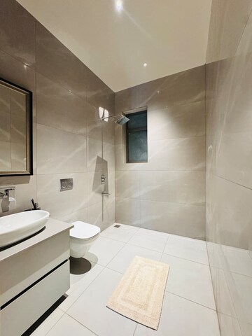 Bathroom in 4 BHK Apartment at International Airport Road – for Sale