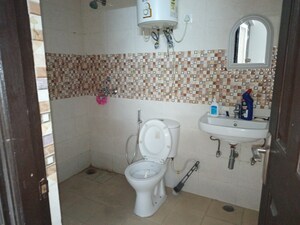 Bathroom in 2 BHK Apartment at Samridhi Grand Avenue, Tech Zone 4 Greater Noida – for Rent